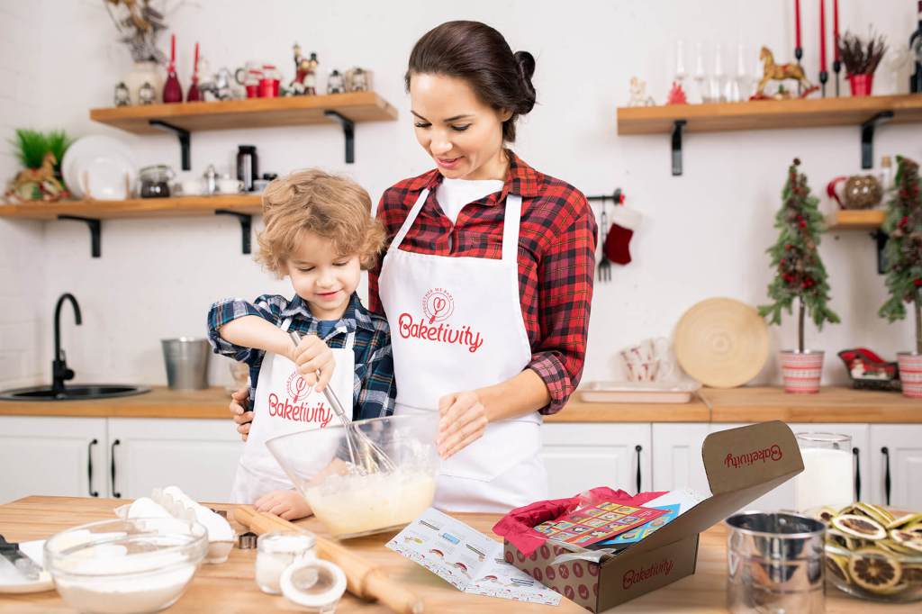 A mom and her son baking