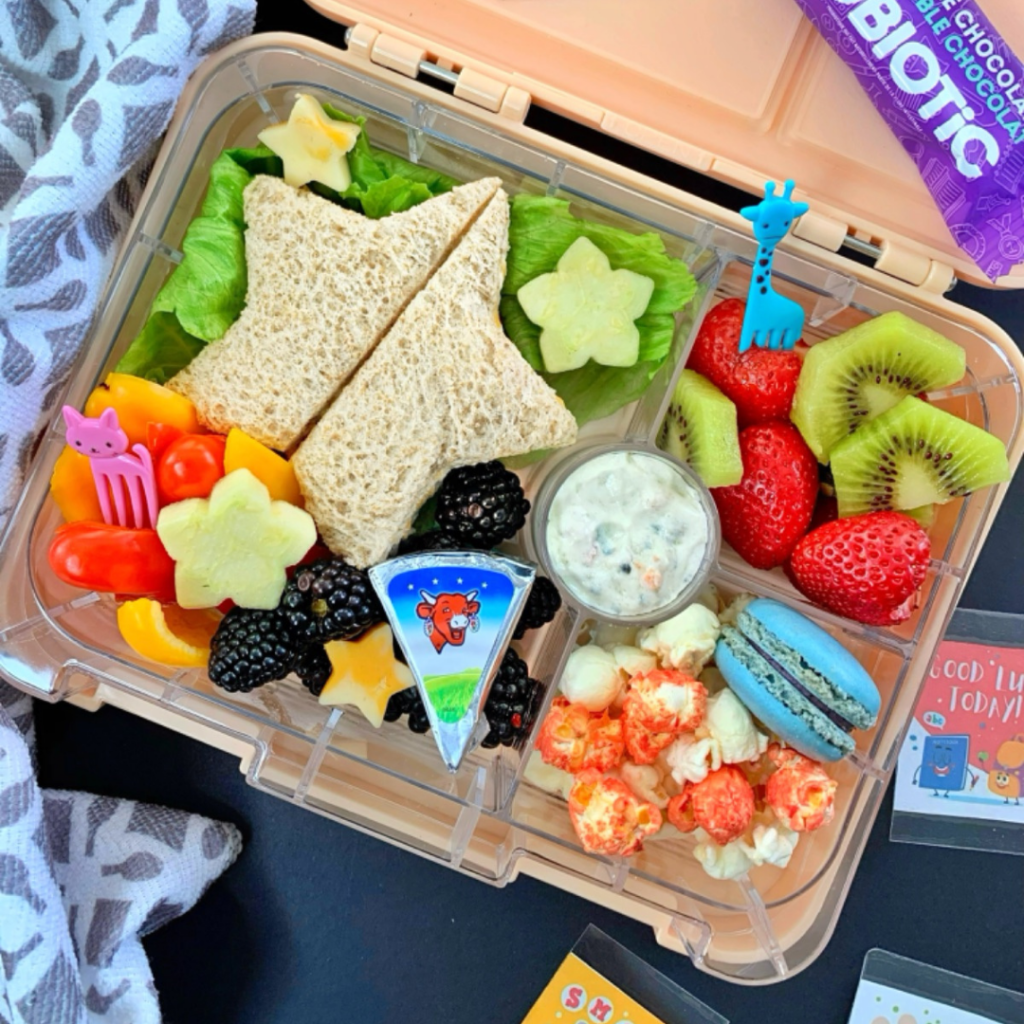 Star-shaped sandwich in a colorful lunchbox for kid