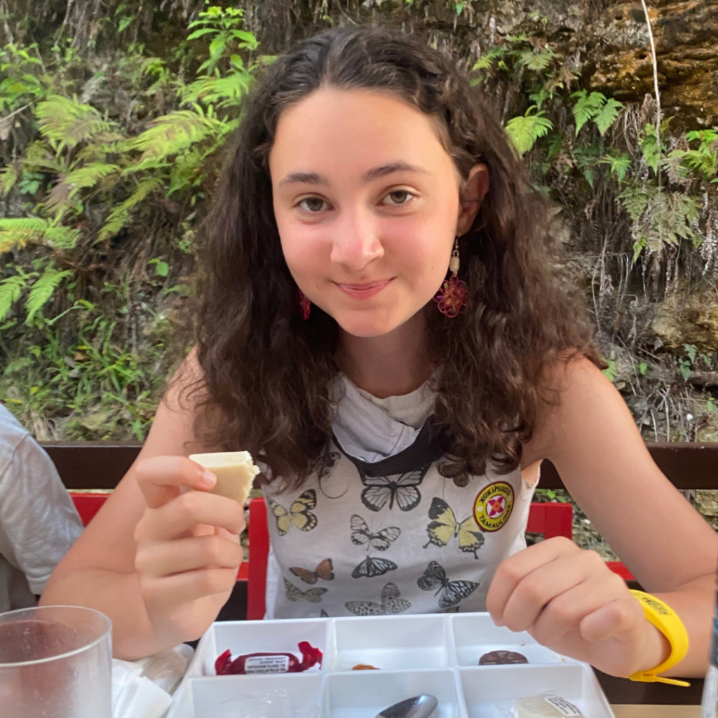 A teenager enjoying Mexican treats for dessert