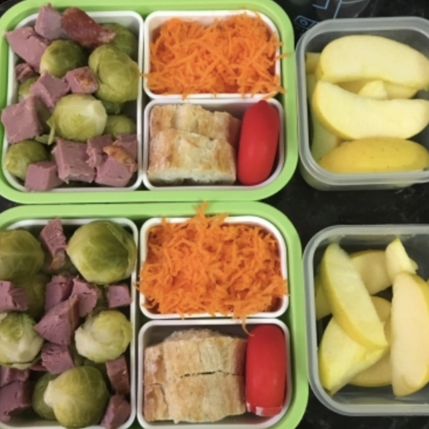 bits of ducks with Brussel sprouts. She also added, grated carrots, Babybel and bread, and, for dessert, apple.