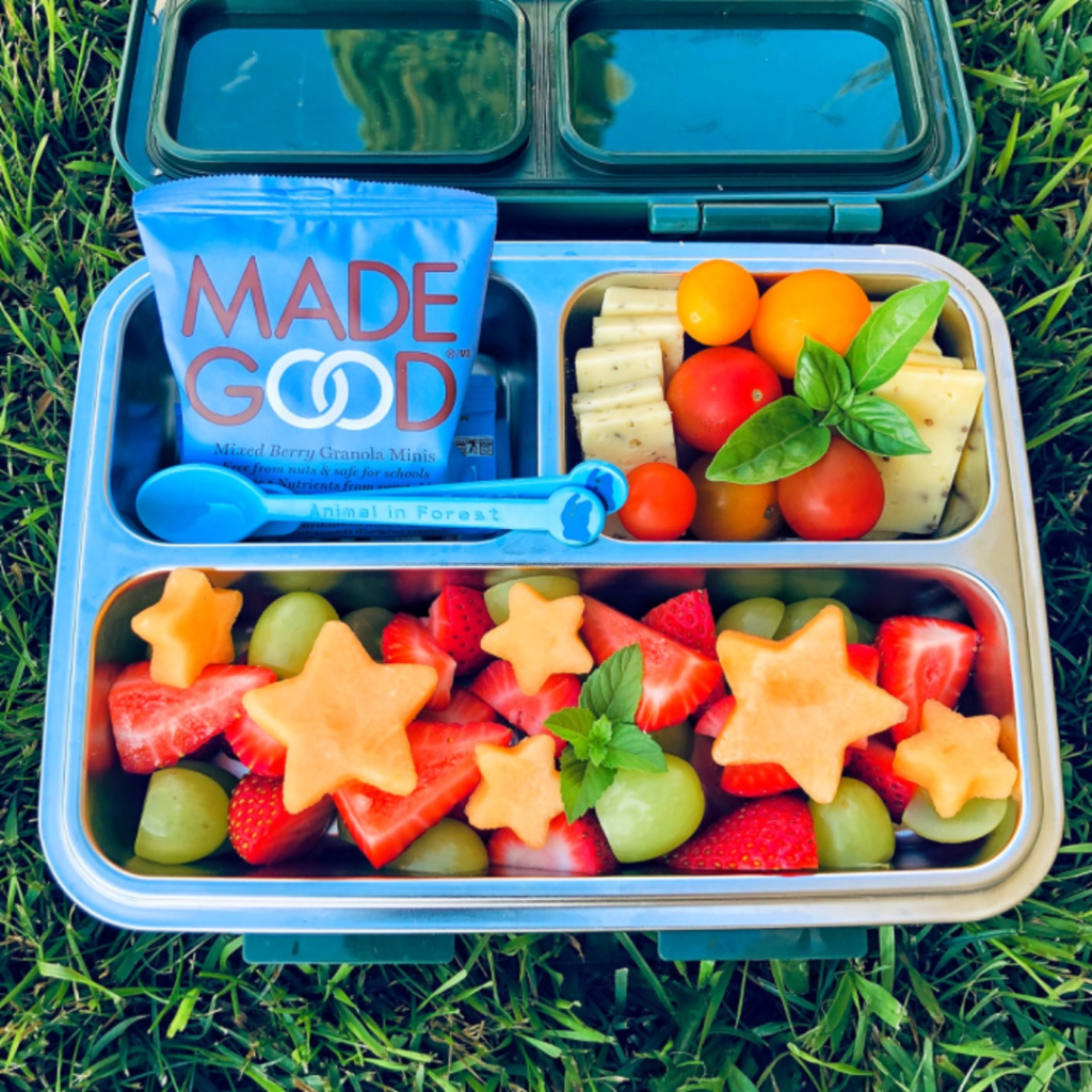 colorful kids' lunch in a bento lunchbox with madegood granola bar for snack