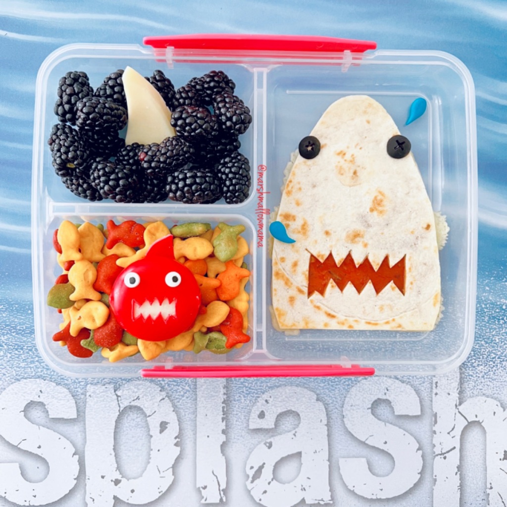 Shark shaped quesadilla and Babybel Shark in a bento, shared on Teuko.com the kids lunchbox ideas community