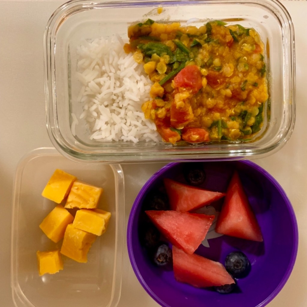 Red lentil curry with rice and vegetables for a delicious kid's lunch