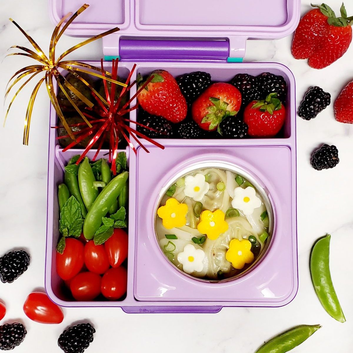 Sugar snap peas and tomatoes are a great fruits and veggies combo for a kid's lunchbox