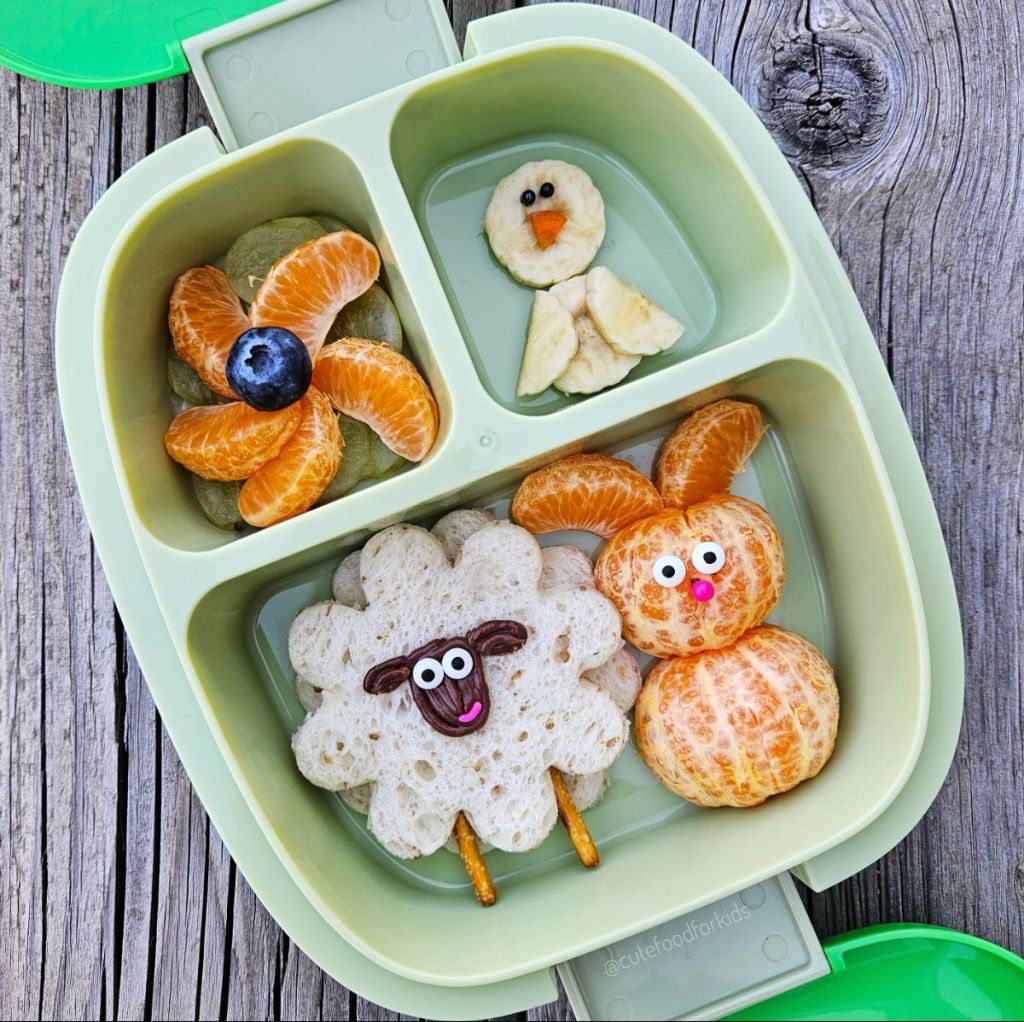 Bunny-shaped mandarin in a cute lunchbox for kids