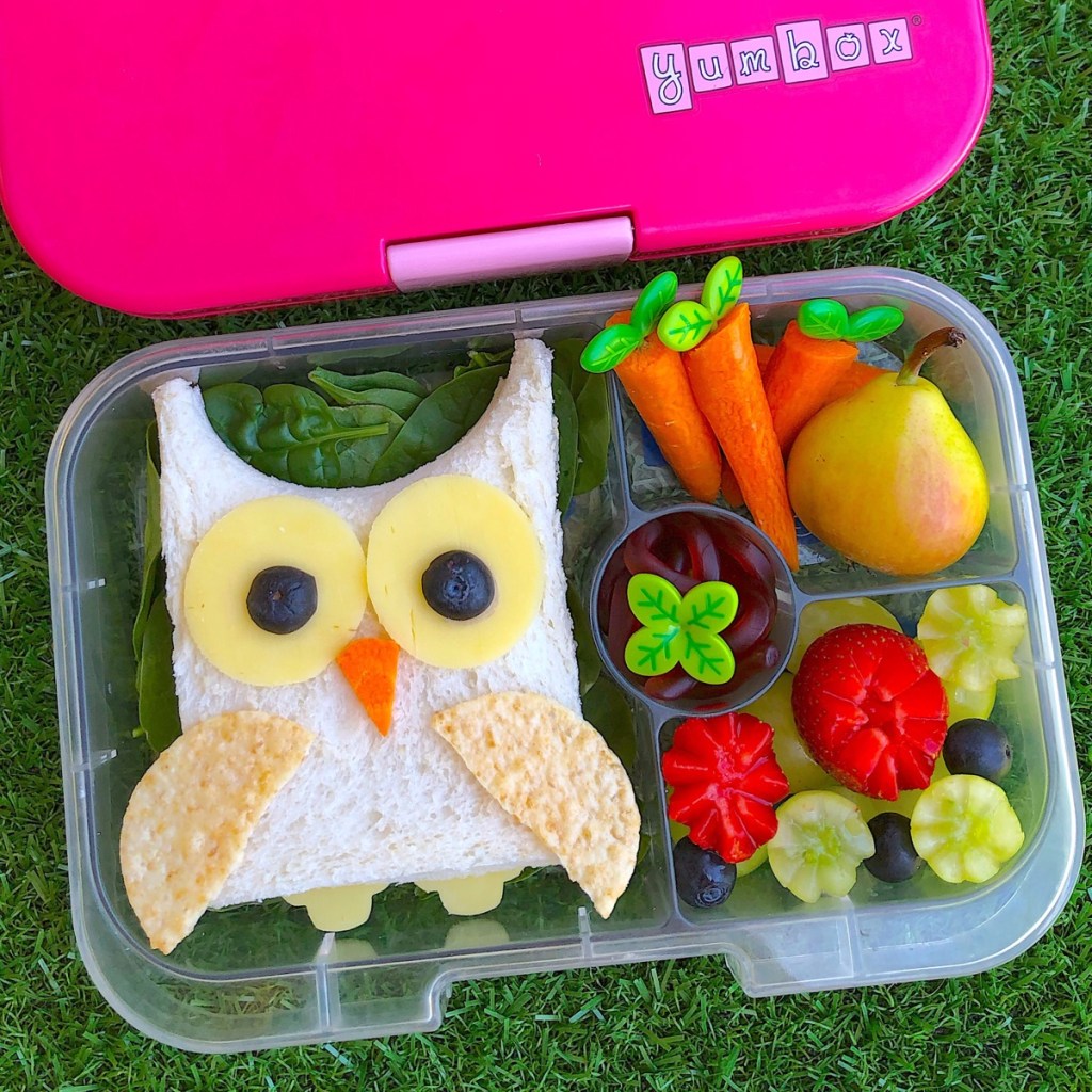 Owl-shaped sandwich in a Yumbox kids' bento lunchbox