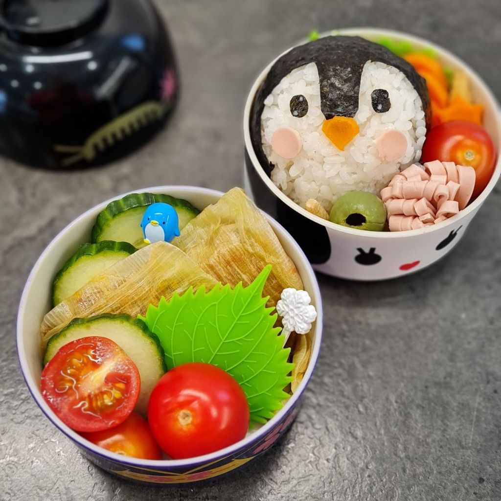Penguin rice ball in a kids bento box