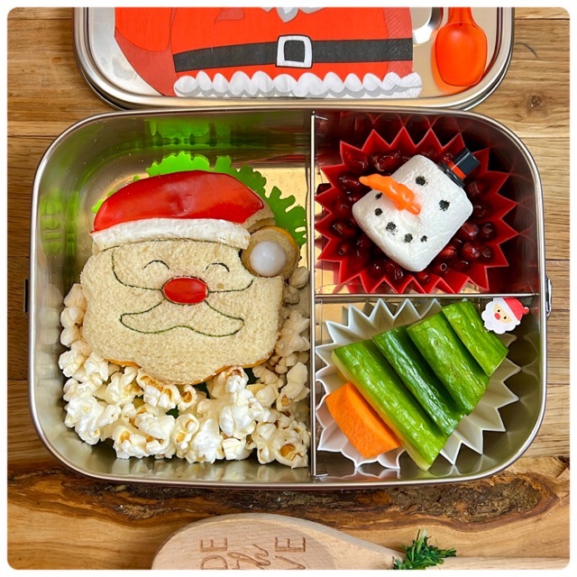 Cute Santa sandwich in a stainless steel lunchbox.