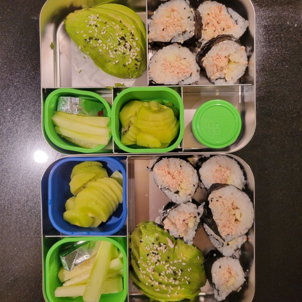 Bento lunchboxes for kids with homemade sushi rolls