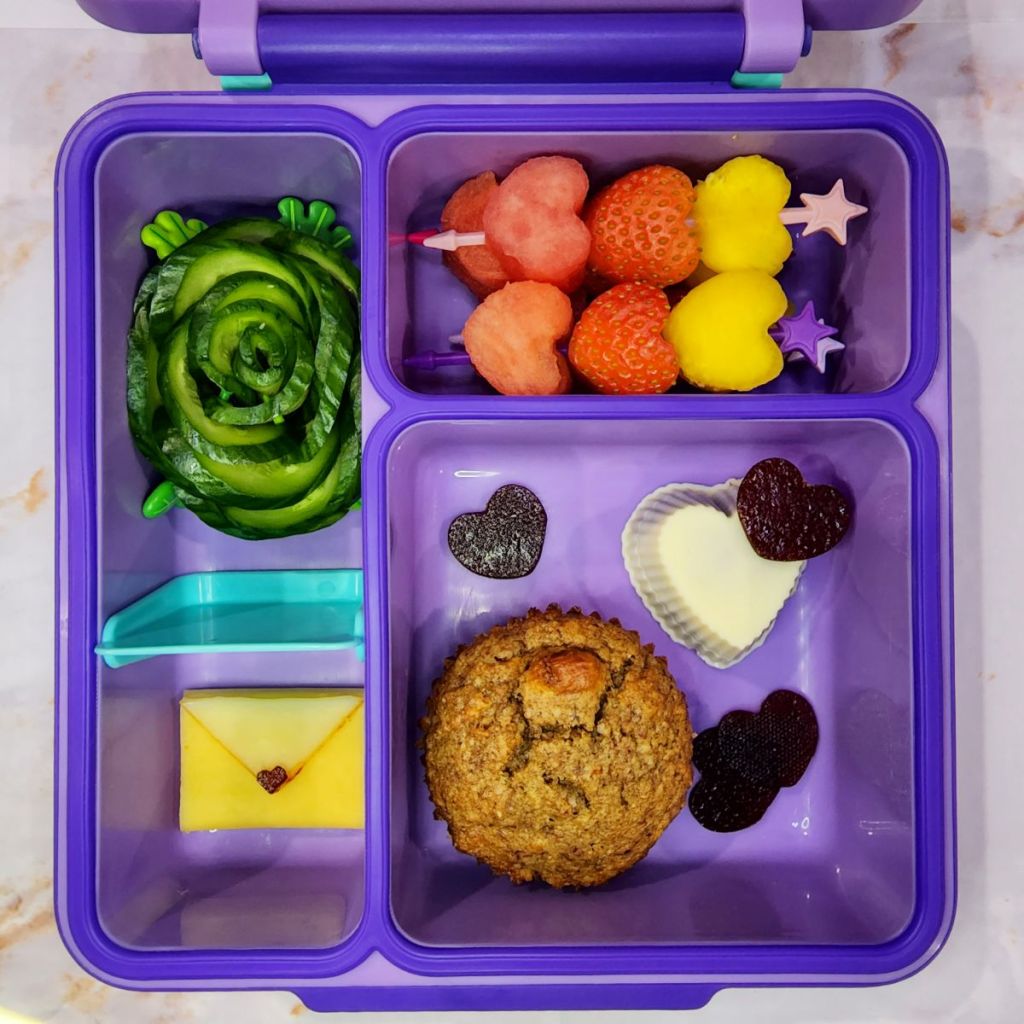 Cucumber slices assembled as a flower in a kid's Omiebox lunchbox