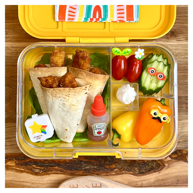 Chicken wraps with summer vibes in a kid's lunchbox